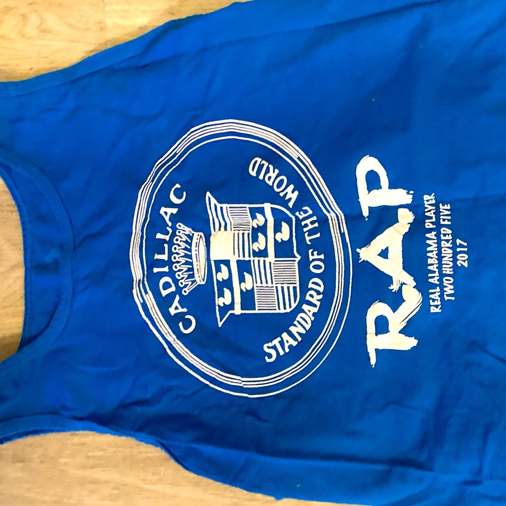 RAP sleeveless shirt. Let’s call if a Jersey or a tank top. Super rare.